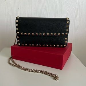 Valentino Rockstud leather clutch on chain
